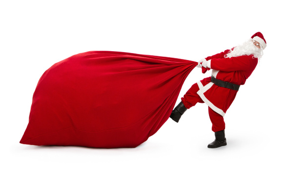 Weihnachtsmann mit riesiger Tasche - Foto, Bild