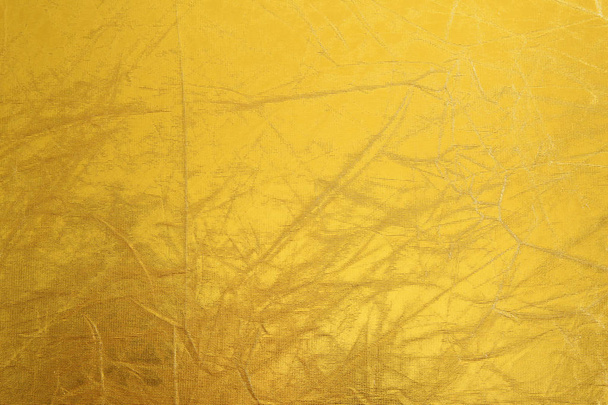 Shiny metal yellow texture background. Metallic pattern - Photo, Image