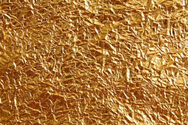 Shiny metal yellow golden texture background. Metallic gold patt - Photo, Image