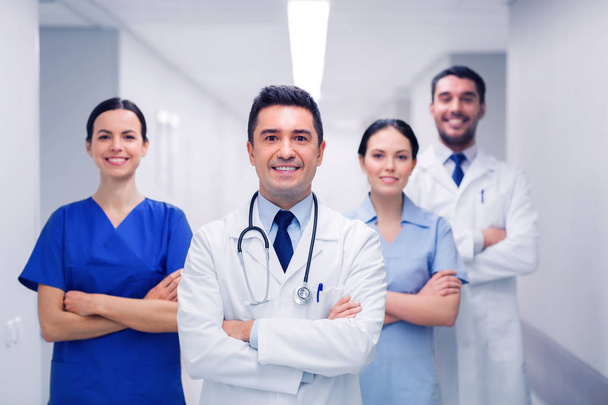 happy group of medics or doctors at hospital - Фото, изображение
