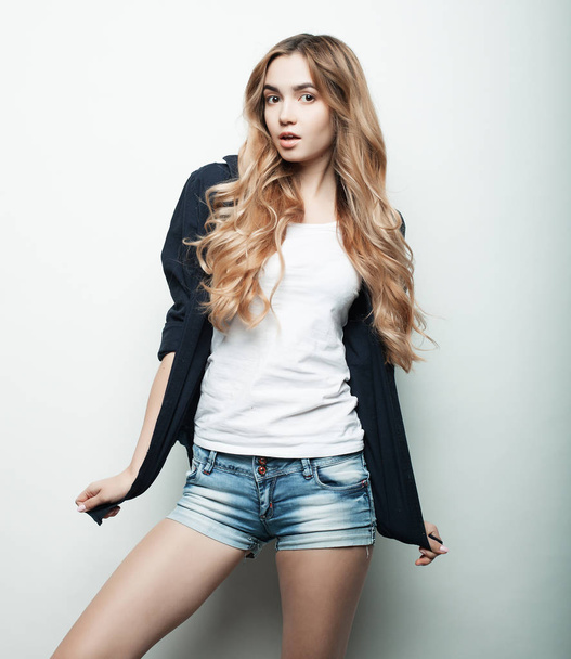 fashion model posing in studio, white background - Photo, Image