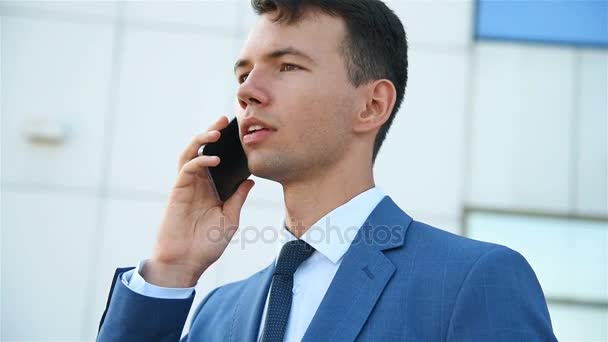 Businessman Talking Mobile Phone - Video