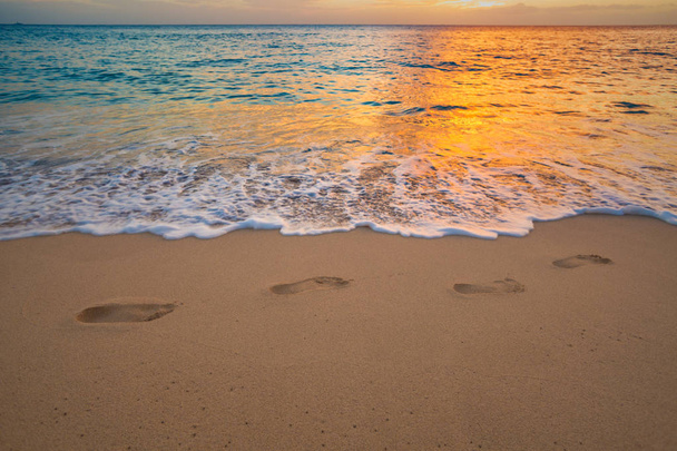 Footprints on beach sand - Valokuva, kuva