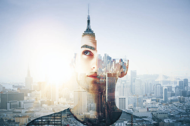 Abstract portrait of thoughtful handsome young guy on city background with tower and sunlight. Career concept. Double exposure  - Foto, Imagen