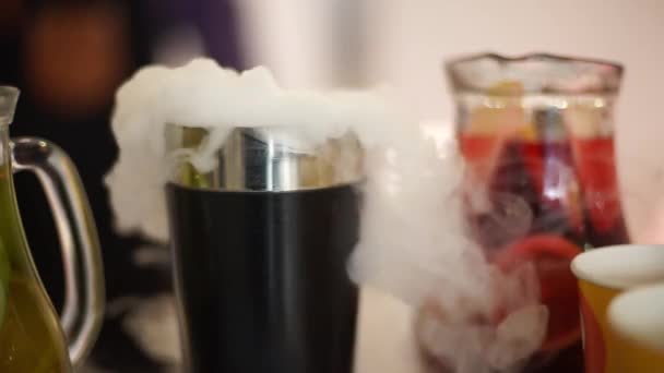 Drink in the glass with the effect of dry ice. - Video