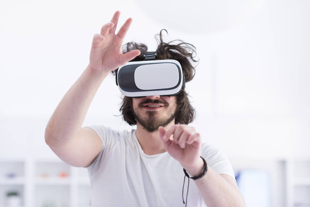 man using VR-headset glasses of virtual reality - Foto, immagini