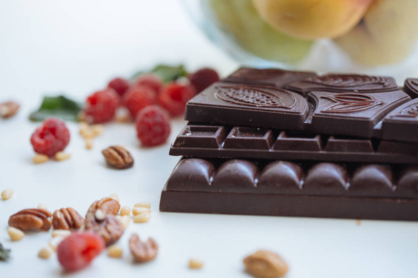 Close-up home made chocolate with berries and nuts - 写真・画像