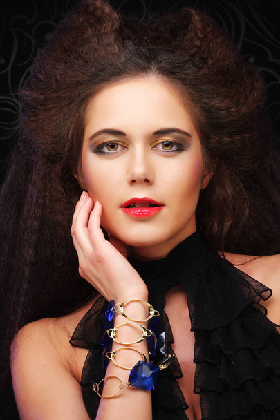 Beautiful young woman with magnificent hairdo - Valokuva, kuva
