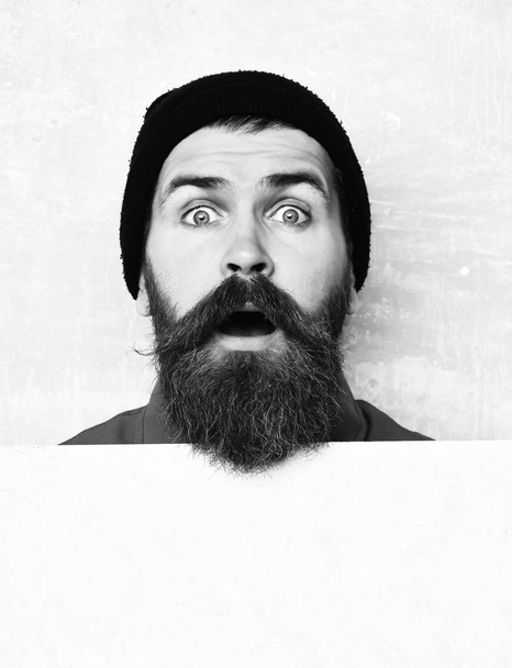 bearded man posing on studio wall background - Photo, Image