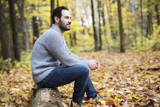 middle-aged man alone on beautiful autumn day - Fotó, kép