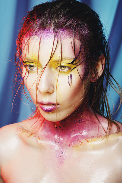 High fashion model girl portrait with colorful vivid make up. Ab - Фото, зображення