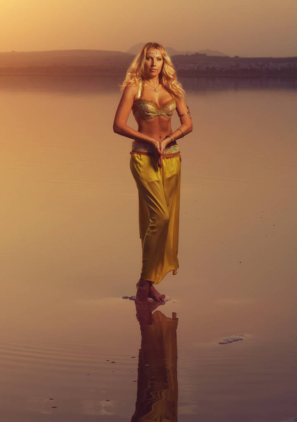 Beautiful blonde belly dancer woman - Valokuva, kuva
