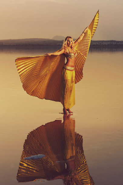 Beautiful blonde belly dancer woman - Foto, imagen