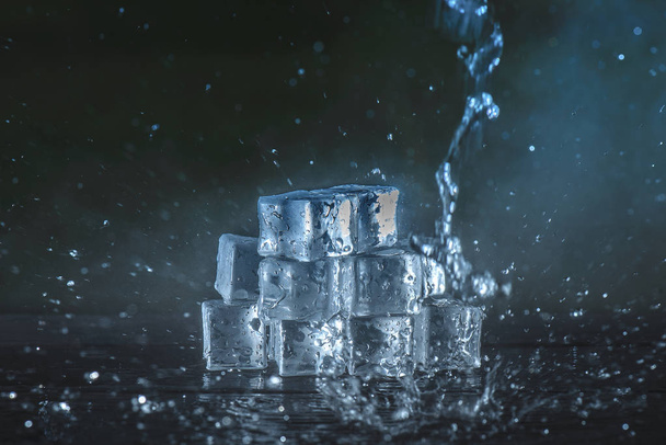 ice cubes with water splashes - Foto, Imagem