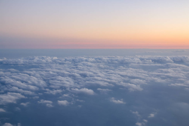 Голубое небо на фоне облаков. Вид с самолета
 - Фото, изображение