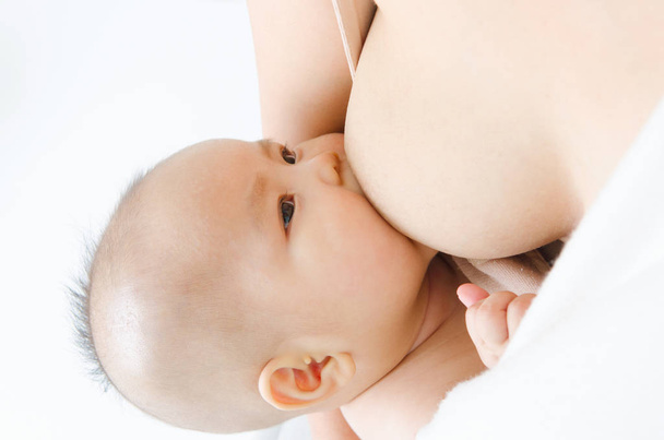 Baby drinking breastmilk - Fotó, kép