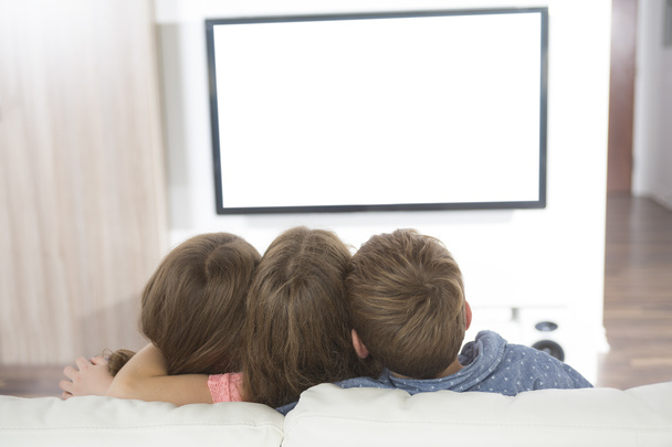 child watching TV at home - Photo, Image