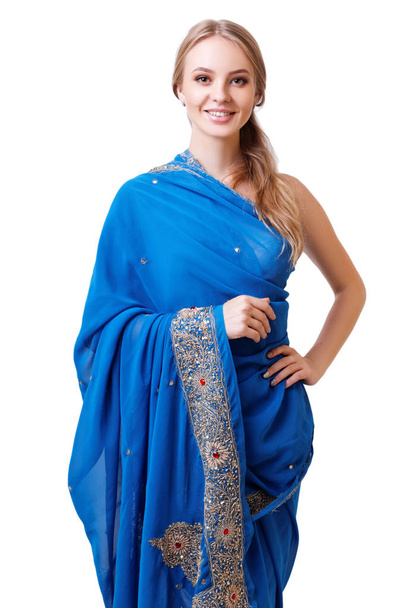 Caucasian young woman in blue indian national dress isolated - Valokuva, kuva