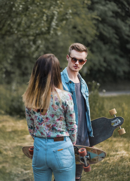 Hipsters with Skateboards - Foto, Bild