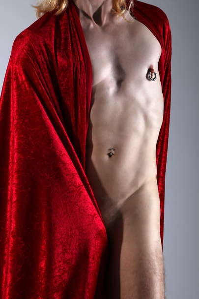 Sexy man in a red blanket - Foto, Imagem