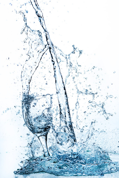 Water splash out of glass - Фото, изображение