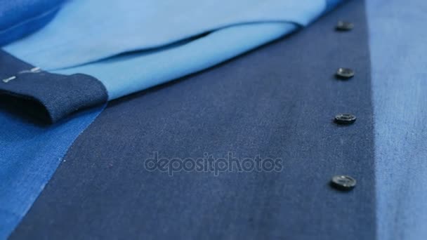 Dolly shot of smart business womens suit jacket - denim, texture, buttons - Video, Çekim