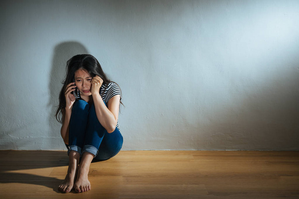 woman using mobile smartphone calling for help - Фото, зображення