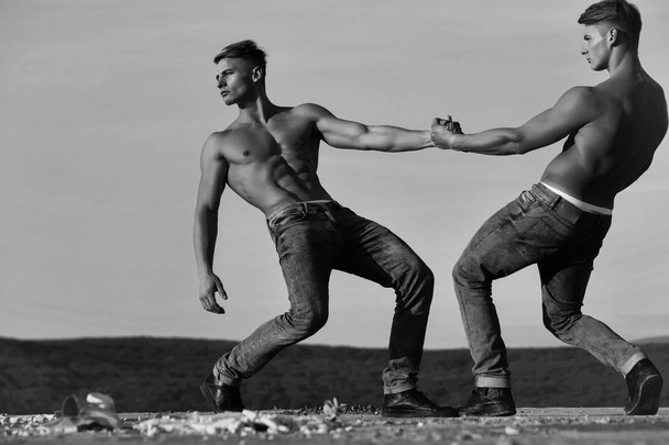 men or bodybuilders wrestling - Zdjęcie, obraz
