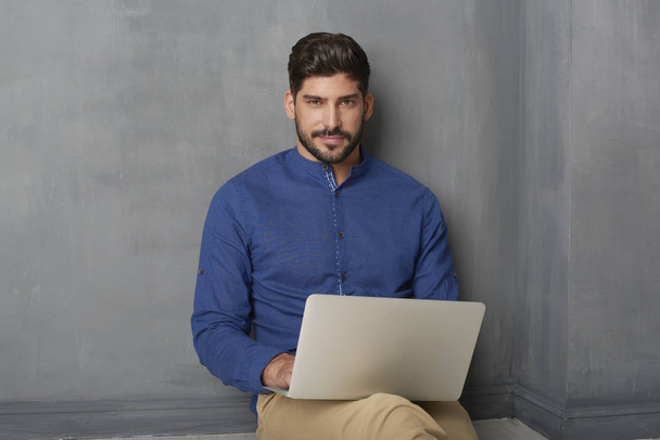 Young man with laptop   - Photo, Image
