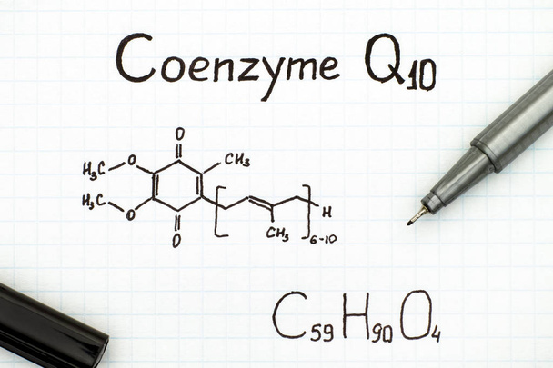 Chemical formula of Coenzyme Q10 with pen - Valokuva, kuva