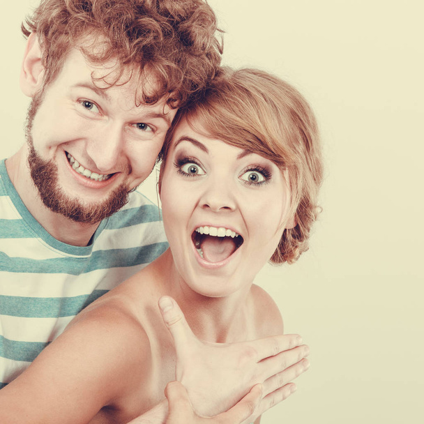 Funny young couple making silly face - Foto, Imagem