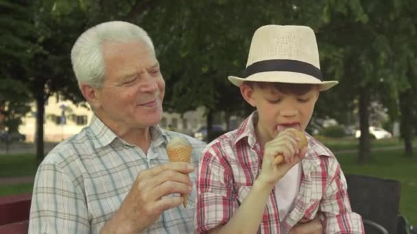 Little boy shows his thumb up near his grandpa - Footage, Video