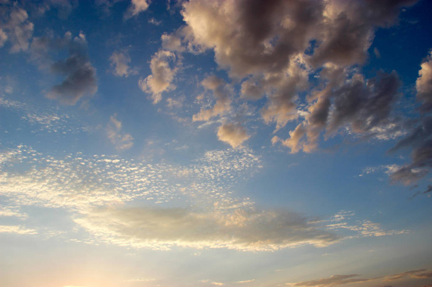 background of the sunset sky and some clouds - Photo, Image