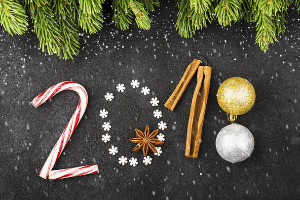 New Year background of snowflakes, sweets, candies, cinnamon, balls number year 2018 - Fotó, kép