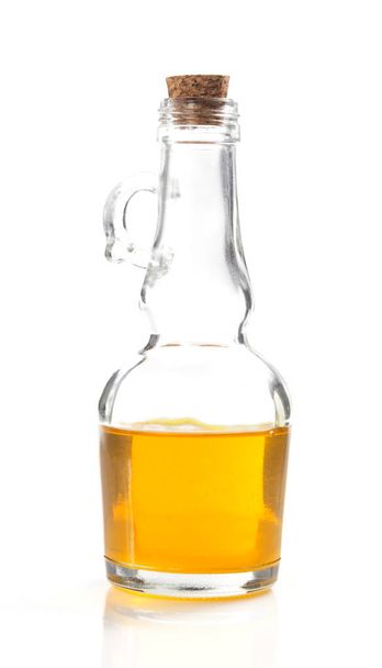 food oil in bottle on white  - Foto, afbeelding