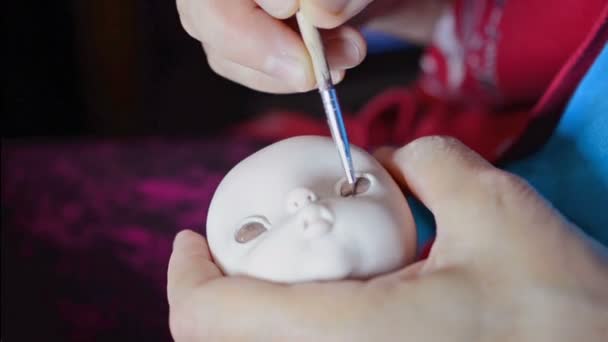 The master artist processes for doll's head billet. - Footage, Video