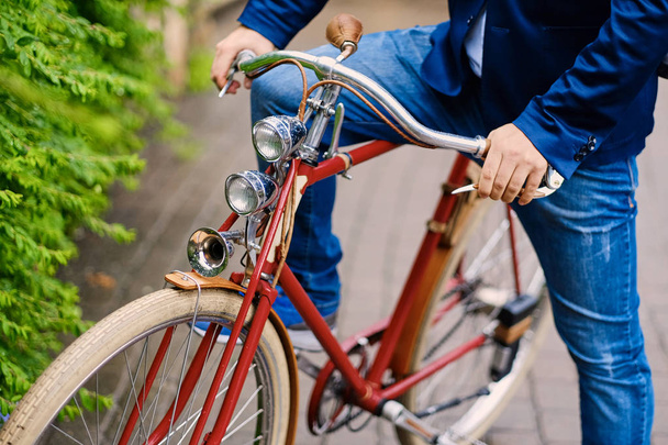 Man on a retro bicycle - Фото, изображение