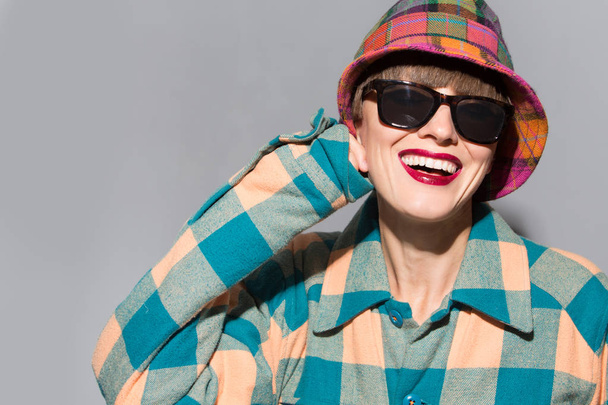 Young stylish woman in coat and hat - Valokuva, kuva