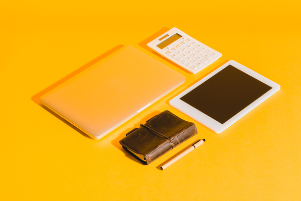 digital devices on yellow - Фото, изображение