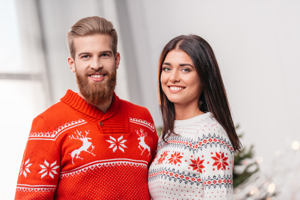 couple in knitted sweaters  - Фото, изображение