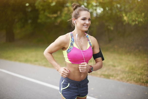  woman jogging outdoors - Photo, Image