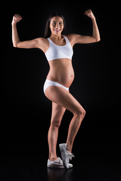 sportliche asiatische schwangere Frau - Foto, Bild