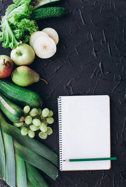 Notebook with vegetables and fruits - Fotoğraf, Görsel
