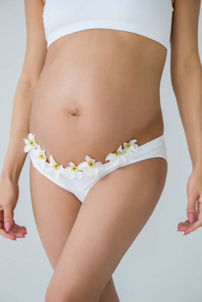 Belly terhes nő virágok - Fotó, kép