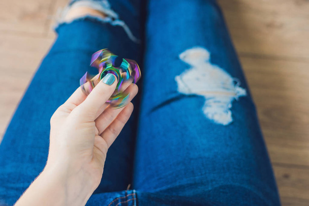 Girl teenager plays with spinner - Photo, image