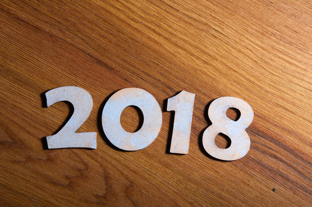 decorative numerals 2018 on wooden table - Foto, Imagem