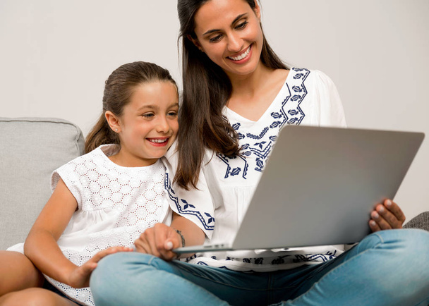 Mother and Daughter with laptop  - Fotó, kép