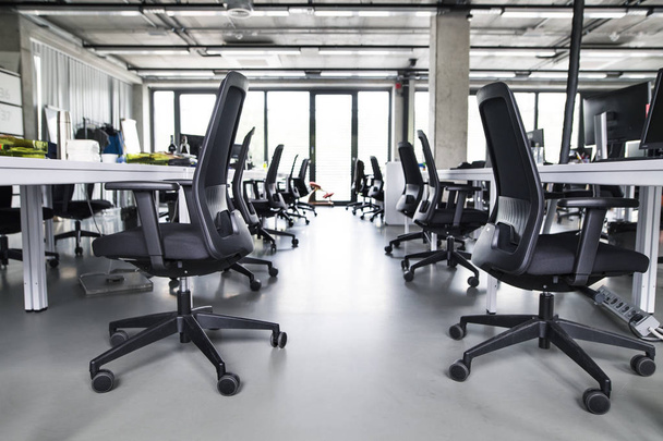 The interior of big empty modern office after work. - Photo, Image