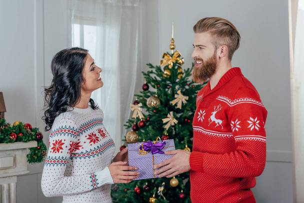 man giving present to girlfriend - Photo, Image