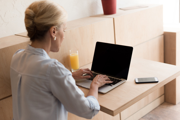mature woman using laptop - Photo, Image